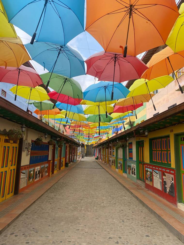 Colourful umbrella-lined street in Antioquia